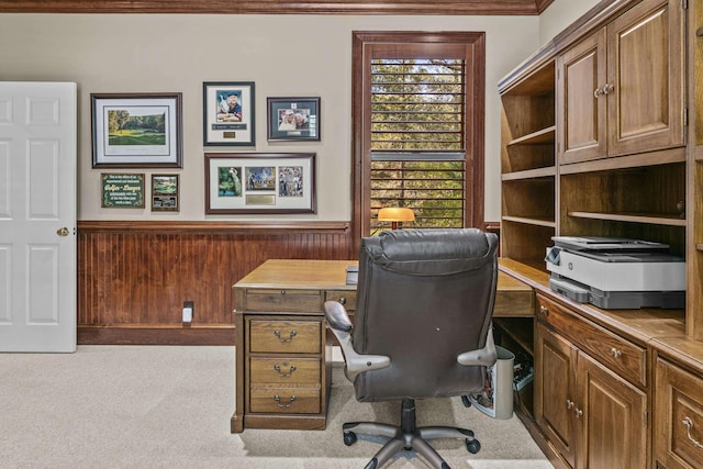 carpeted office space with wooden walls