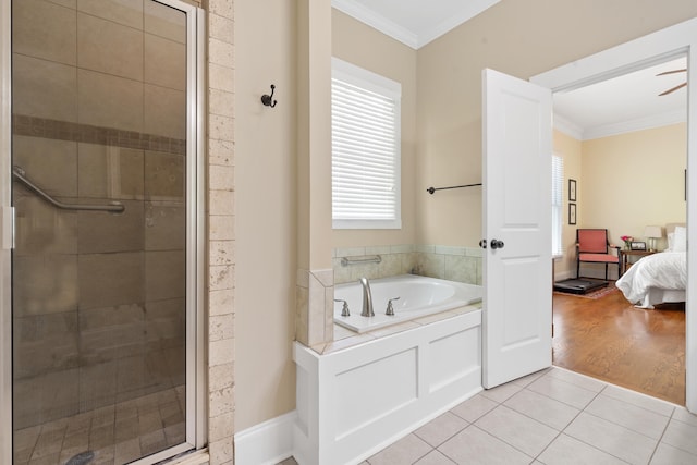 ensuite bathroom with crown molding, a garden tub, ensuite bathroom, a stall shower, and tile patterned floors