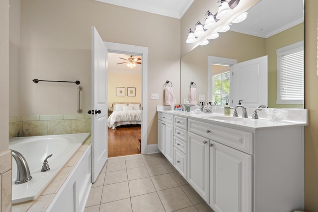 bathroom featuring a sink, ornamental molding, double vanity, and tile patterned flooring