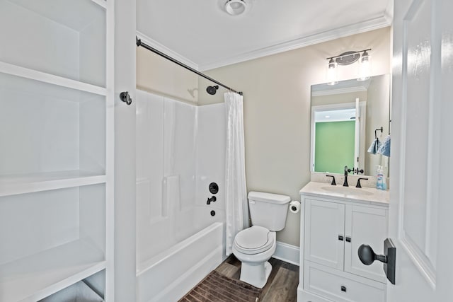 full bathroom with hardwood / wood-style flooring, ornamental molding, vanity, shower / tub combo, and toilet