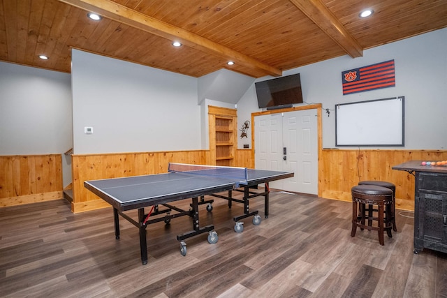 game room with beamed ceiling, wood walls, dark wood-type flooring, and wooden ceiling