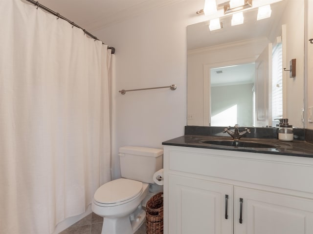 bathroom featuring vanity, tile patterned floors, ornamental molding, and toilet