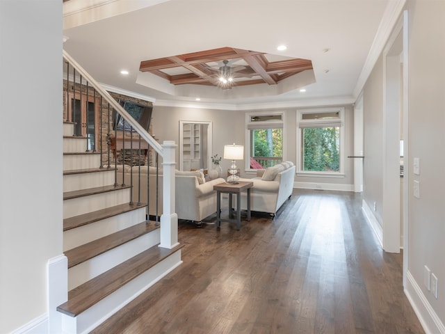 living room with crown molding, coffered ceiling, dark hardwood / wood-style flooring, and beam ceiling