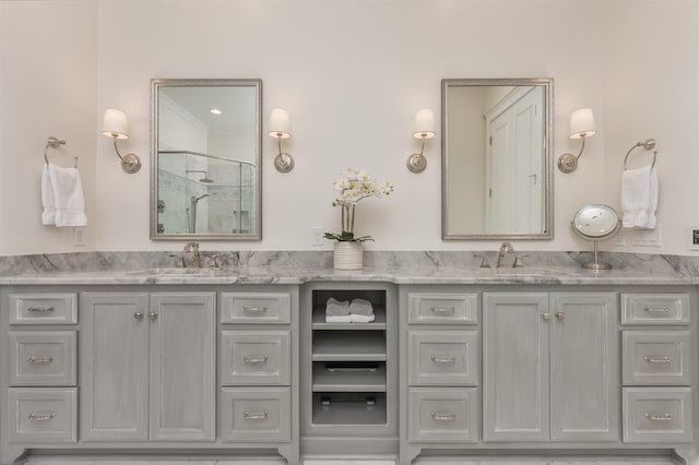 bathroom with walk in shower and vanity