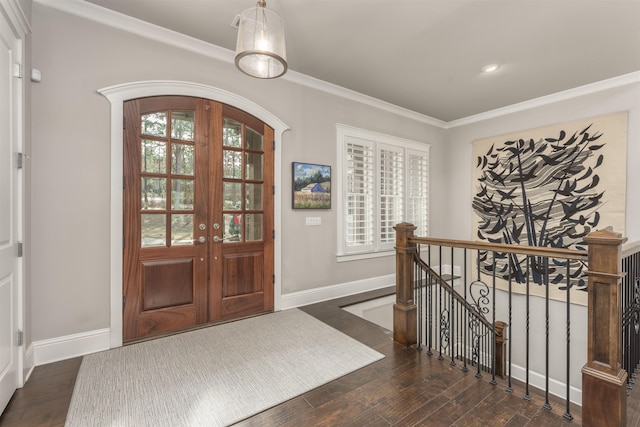 entryway with crown molding, french doors, and a healthy amount of sunlight