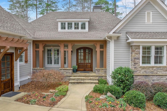 entrance to property with french doors and covered porch