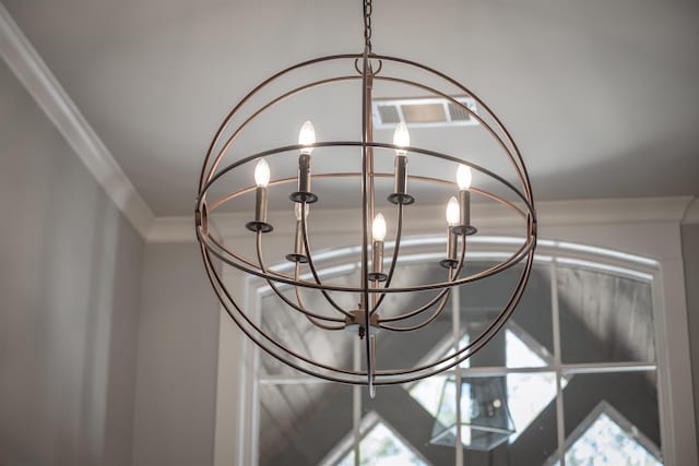 room details featuring an inviting chandelier and visible vents