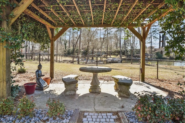 view of yard with a patio area, a pergola, and fence