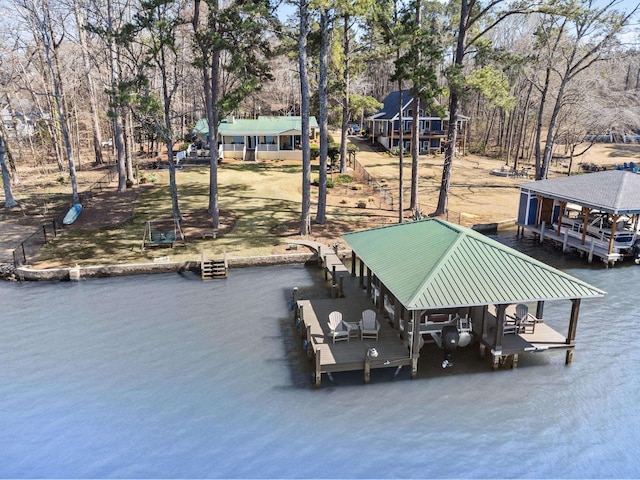 view of dock featuring boat lift and a water view