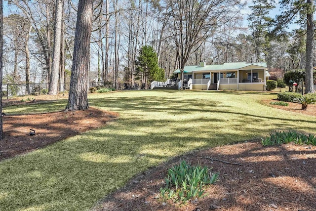 view of yard with a porch