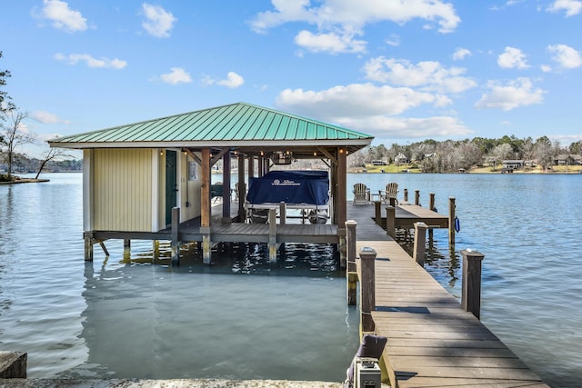 view of dock with a water view and boat lift