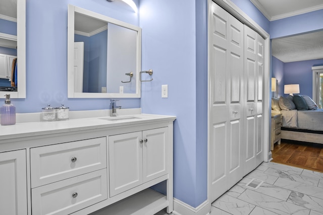 full bathroom featuring marble finish floor, vanity, connected bathroom, and ornamental molding