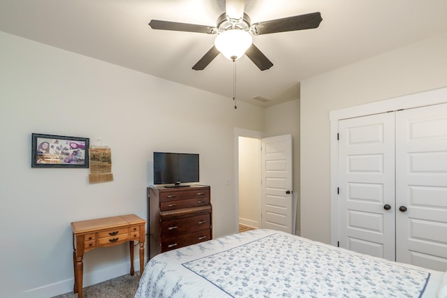 5761 Dixie Hwy, Rutledge, GA 30663 - carpeted bedroom featuring a closet, baseboards, and a ceiling fan