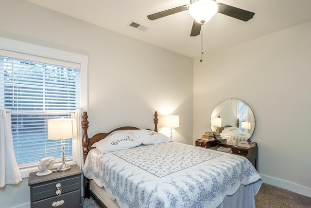 5761 Dixie Hwy, Rutledge, GA 30663 - bedroom with carpet, multiple windows, baseboards, and a ceiling fan