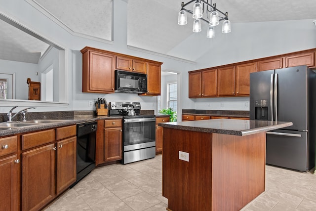 kitchen featuring a textured ceiling, black appliances, vaulted ceiling, and a sink