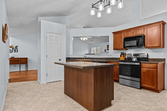 kitchen featuring a center island, stainless steel electric range, brown cabinetry, black microwave, and vaulted ceiling