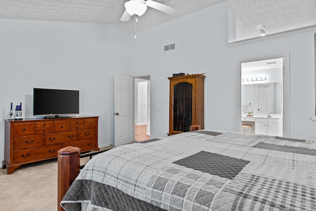 bedroom featuring visible vents, high vaulted ceiling, ceiling fan, a textured ceiling, and light colored carpet