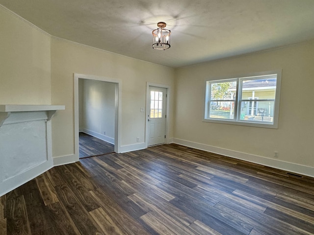 unfurnished living room featuring dark hardwood / wood-style flooring