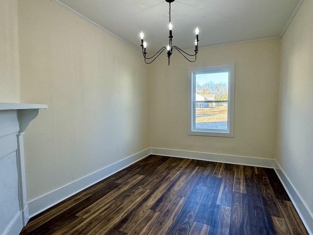 unfurnished dining area featuring an inviting chandelier, dark wood-type flooring, and ornamental molding