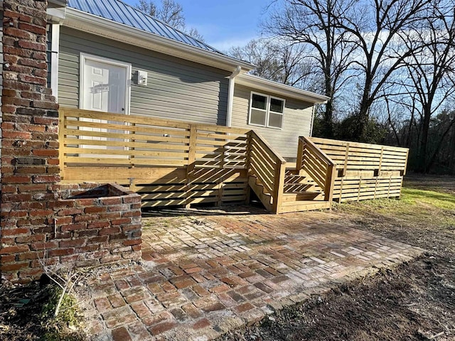 doorway to property featuring a deck