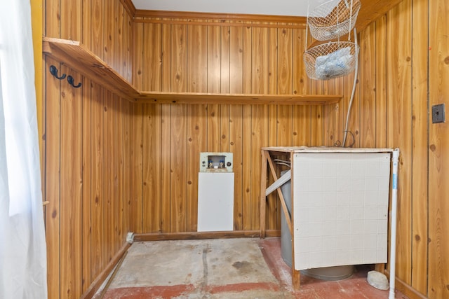 washroom with washer hookup and wooden walls