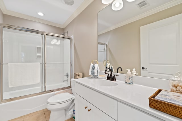 full bathroom featuring ornamental molding, bath / shower combo with glass door, tile patterned floors, and toilet