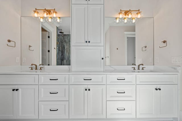 bathroom featuring vanity and a shower