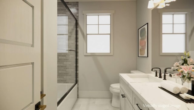 full bathroom featuring toilet, vanity, and bath / shower combo with glass door