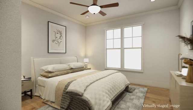 bedroom featuring crown molding, ceiling fan, and light hardwood / wood-style flooring