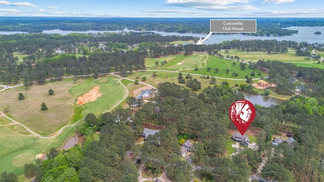 aerial view with a water view and golf course view