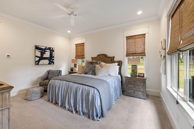bedroom with ornamental molding, baseboards, recessed lighting, and light colored carpet