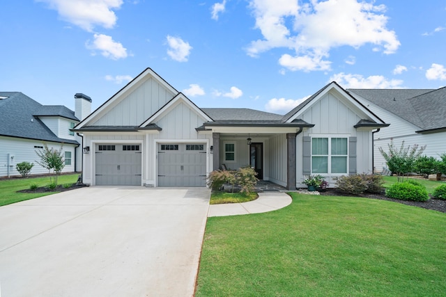 view of front of home with concrete driveway, an attached garage, board and batten siding, and a front lawn