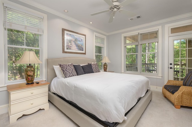 carpeted bedroom featuring crown molding, access to exterior, and ceiling fan