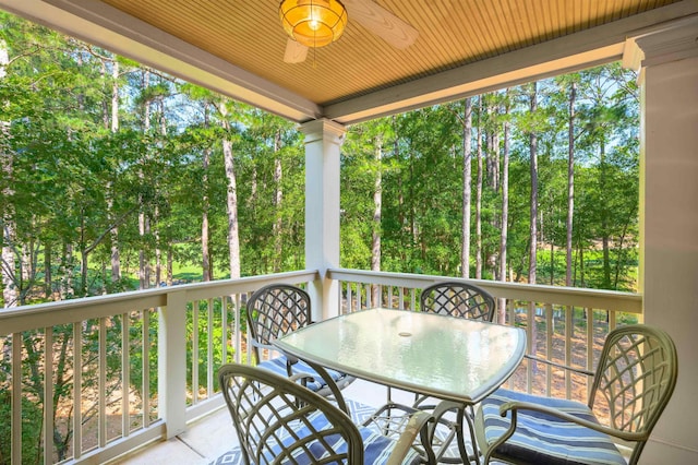 wooden deck with ceiling fan