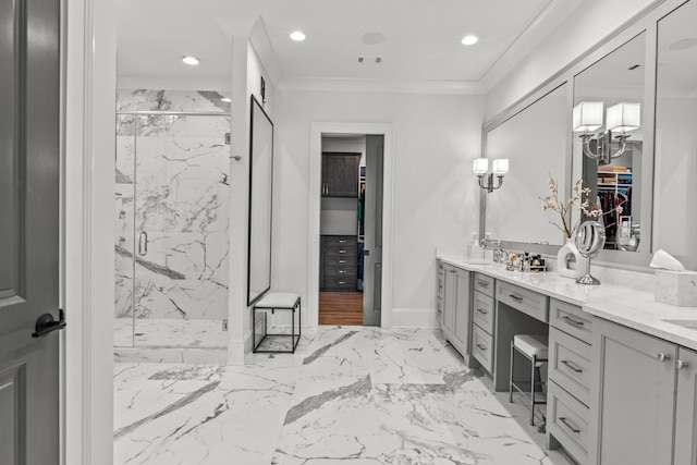 bathroom with a marble finish shower, crown molding, double vanity, marble finish floor, and a sink