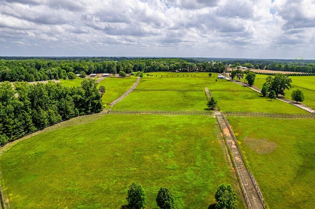 birds eye view of property with a rural view