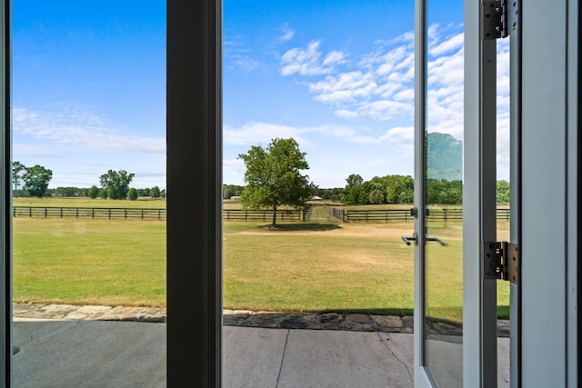 doorway featuring a rural view