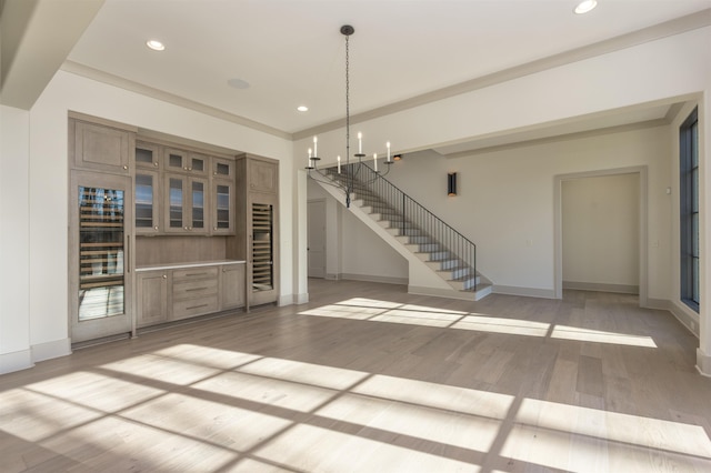 unfurnished living room featuring light hardwood / wood-style floors