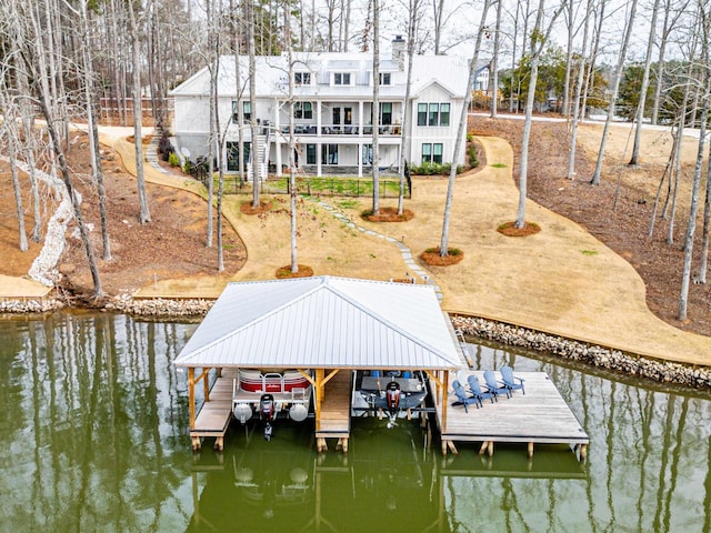 view of dock with a water view and boat lift