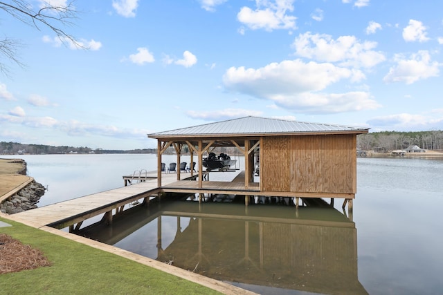 view of dock with a water view and boat lift