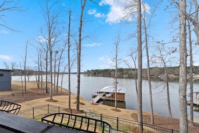 exterior space with a dock and fence