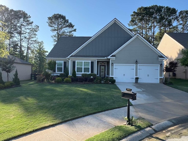 1041 Creekwood Cir, Madison, GA 30650 - view of front of home with board and batten siding, concrete driveway, a garage, and a front yard