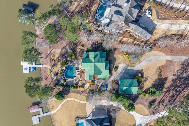 birds eye view of property featuring a water view