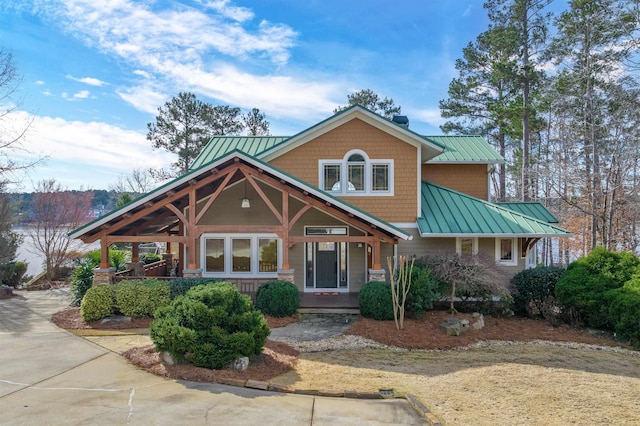 view of front of home with a standing seam roof and metal roof