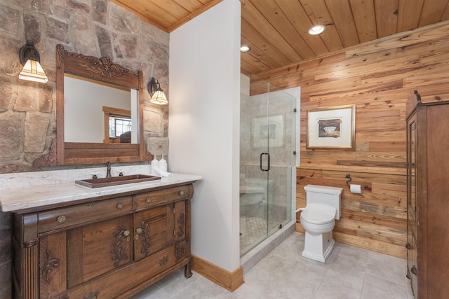 full bathroom featuring toilet, wood ceiling, a shower stall, vanity, and tile patterned flooring