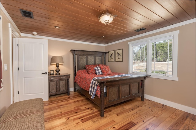 bedroom with ornamental molding, wooden ceiling, light wood-style flooring, and visible vents