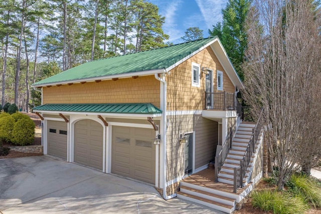 garage featuring driveway