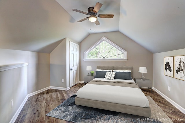 bedroom with lofted ceiling, dark wood-type flooring, and ceiling fan