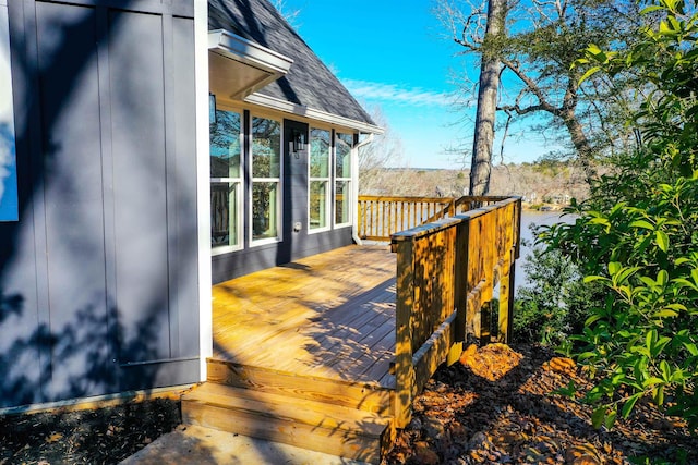 wooden terrace featuring a sunroom