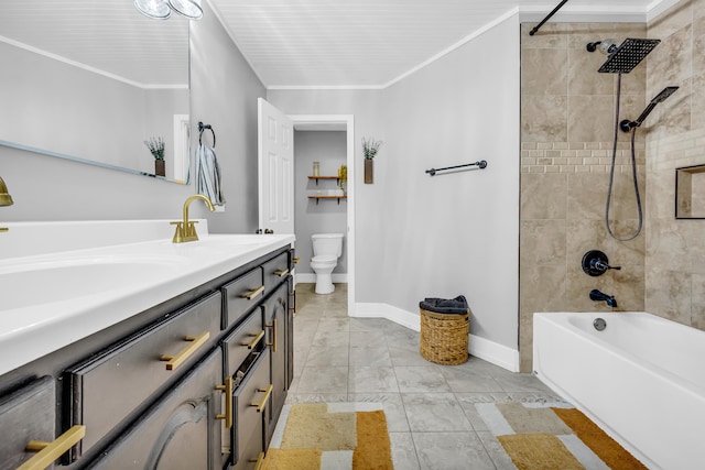 full bathroom with vanity, tiled shower / bath, crown molding, and toilet